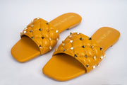 mustard yellow studded flats with padded insole and golden studs
